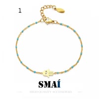 سوارة الكف بقطع الخرز الصغيرة