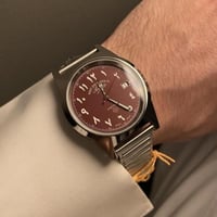 ساعة ويست إند - عربيه اللون عنابي