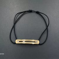 سوارة نسيج يدوي باللون الاسود والذهبي