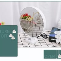 مرايه مضيئة مع التغليف والورد