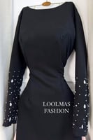 فستان سهره توب بأكمام طويلة وبذيل لون اسود
