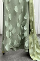 فستان سهره بقصة مايلة لون أخضر فاتح