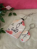 تعليقة +ميداليه بأسم .