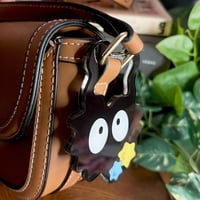 حاملة ميداليات كرة الغبار