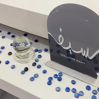 استند اكريلك للمواليد