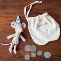 كيس الاسنان مع الفأر