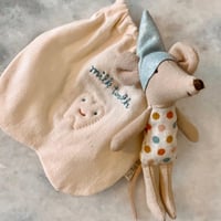 كيس الاسنان مع الفأر