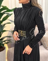 ‎فستان ترتر اسود جيرسيه برقبة عالية ودرابيه عالصدر...