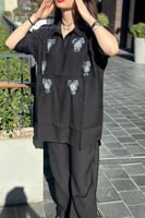 طقم قميص وبنطلون بقصة واسعة مطرز