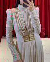 ‎فستان ترتر اسود جيرسيه برقبة عالية ودرابيه عالصدر...