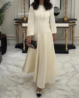 فستان ميدي لؤلؤي بقصة منخفضة