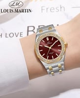 ساعة نسائية من لويس مارتن اللون الفضي و الذهبي