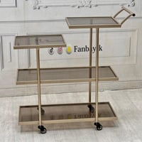 ترولي/ تقديم ٤ دور ذهبي زجاج عسلي