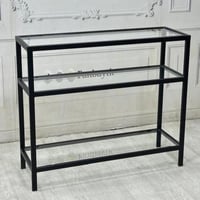 مدخل ثلاثي الأدوار بتصميم زجاج ومعدن أسود