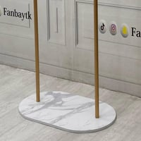 حامل ملابس مودرن بقاعدة بيضاوية-ذهبي-FANBAYTK