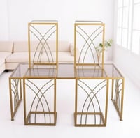 طقم طاولة تقديم لون ذهبي سطح زجاج بني شفاف