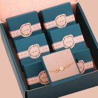 بوكس توزيعات أساور 12 قطعة