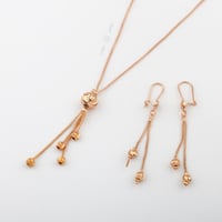 نص طقم مطلي ذهبي