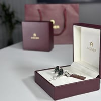 كبك من اجنر للرجال مع الشعار استيل لون فضى واخضر