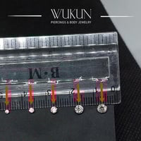 زمام بيرسينج ذهب عيار 18K بفص شفاف لامع كبير