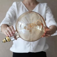 لمبة G200 عسلي 4 واط | قاعدة تثبيت E27 | إضاءة كلا...