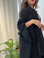 عباية كريب سيراميك أسود فاحم قصة كلوش