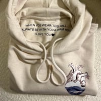 بلوفر القلب مع عباره داخليه