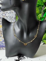 سلسال ديور مع حلق ذهبي