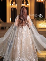 فستان سهرة بيج بتطريز لامع وأكمام طويلة واسعة لمسة...