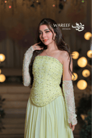 فستان سهرة ليموني راقي باستيل مطرّز باللؤلؤ والكري...