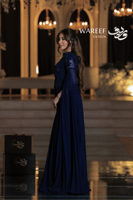 فستان سهرة ازرق طويل ملكي ناعم مع أكمام شفافة مزخر...