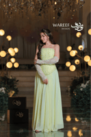 فستان سهرة ليموني راقي باستيل مطرّز باللؤلؤ والكري...