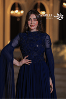 فستان سهرة ازرق طويل ملكي ناعم مع أكمام شفافة مزخر...