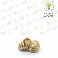 كرتون تمرية محشوة بالطحينة ومغطاه بالسمسم 600 جرام