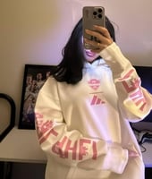 هودي الأهلي الشعار الوردي تصميم جديد