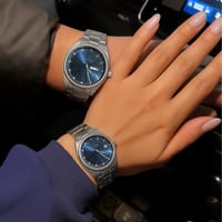 طقم ساعة رجالي ونسائي مميز روكس