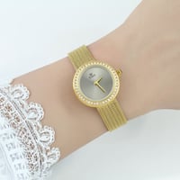 ساعة نسائية دير ستيل ذهبي مينا رصاصي EV28113