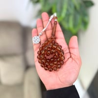 سبحة من بكلايت بالون البني الشفاف