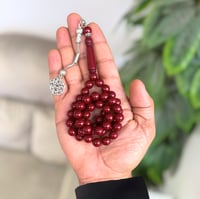 سبحة من بكلايت بالون العنابي