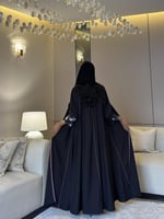 ‏‎عباية كريب تايواني نص كلوش مع قيطان بنفسجي وكم و...