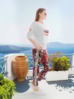 ترنج نسائي باللون البرتقالي والطباعة اللامعه