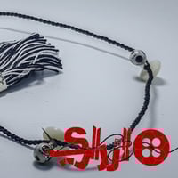 تركيبات عظم من ازراري لاناقة الثوب السعودي