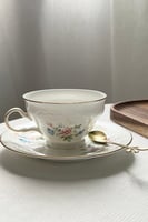 كوب مع صحن شاي طراز ريفي