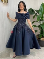 فستان سهرة ميدي مزين بالتطريز