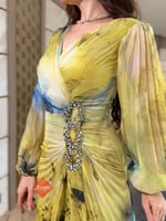 فستان سهرة طويل بليسيه فاخر مزين بالكريستال اللامع