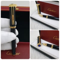 قلم كارتير سانتوس اسود مع ذهبي فص ازرق