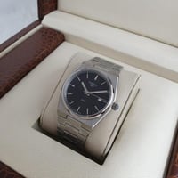 ساعة تيسوت رجالي فضي مع اسود