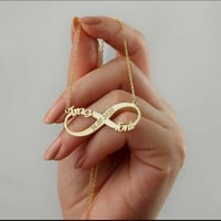 سلسال اسمين وقلبين مطلي بالذهب عيار21