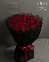 باقة ورد 50 وردة أحمر تغليف قماش