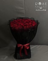 باقة ورد 50 وردة أحمر تغليف قماش
